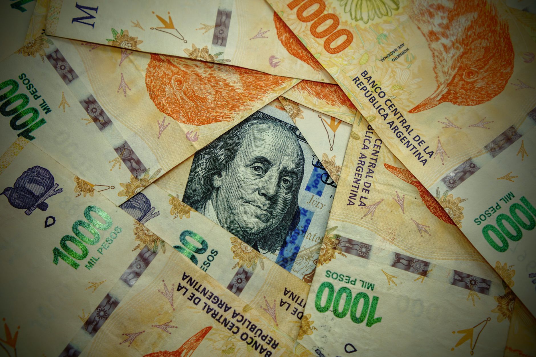 Pesos y dólares